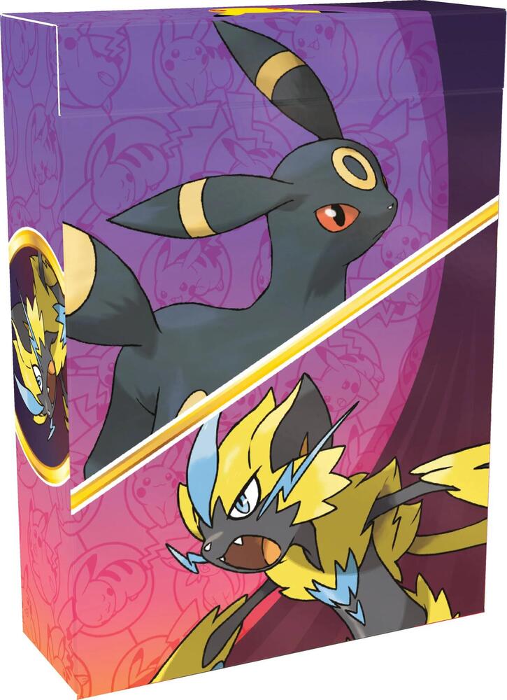 Close up view of 30th celebration battle deck umbreon ex and zeraora foil promo cards through box window